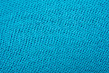 Macro of fabric weave texture surface blue or indigo blue color use for backgroundの写真素材