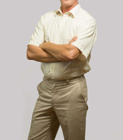 Men's casual outfits standing on a gray background, simple casual wear fashion conceptの写真素材