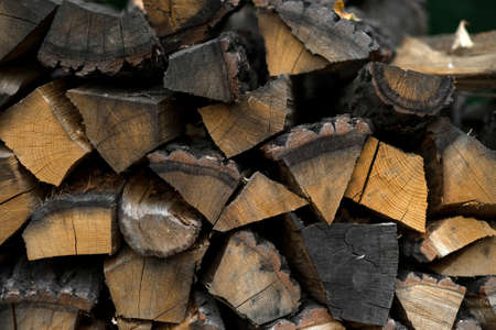 logs wooden log houses neatly stacked as a background and natural texture. copipasteの写真素材