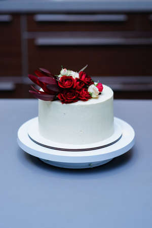 Decorated by flowers white naked cake, rustic style for weddings, birthdays and events.の写真素材