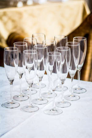 Empty glasses set in restaurant. Part of interior, dinnerの写真素材