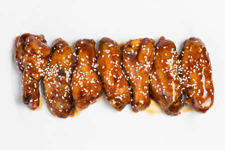 barbecue chicken wings isolated on white background with space for textの写真素材