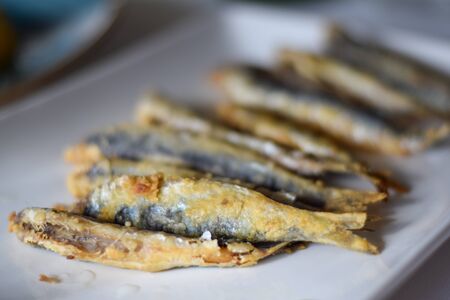 Sardine. Fried fish in a white plate. Spanish tapa. Appetizer.の写真素材