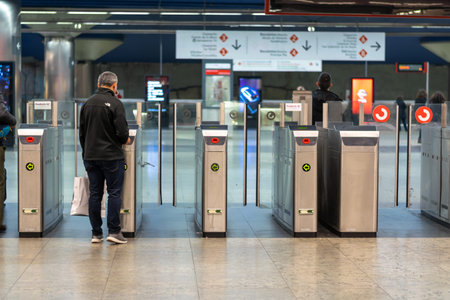 07-12-2018 MADRID, SPAIN. Nuevos Ministerios subway and commuter train station.  Automatic gate...