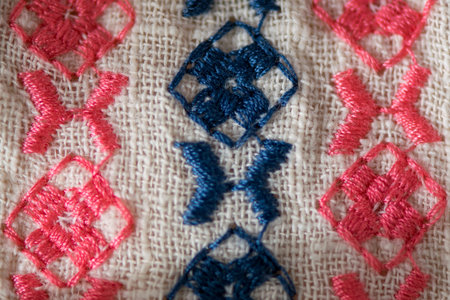 Embroidered pattern on cotton fabric. Fragment. Handmade.の写真素材