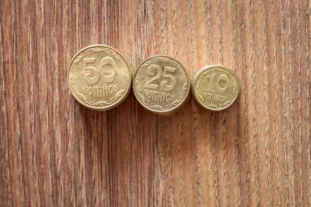 Kopeks the Ukrainian currency, coins on a wooden table.の写真素材