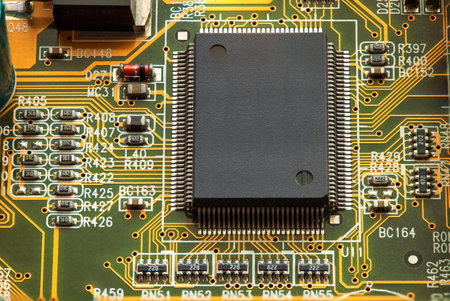 Electronic circuit board with processor, close up.
