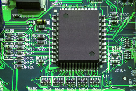 Electronic circuit board with processor, close up.