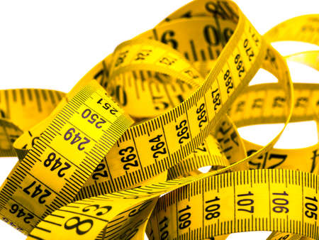 Centimeter of yellow color from fabric for measurement of length and volume on a white background.
の写真素材