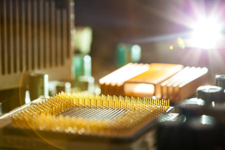 The computer processor contacts in a shot,  back light.