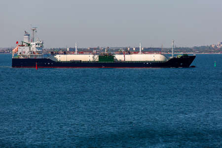The lng ship, gas carrier vessel coming into the sea port.の写真素材