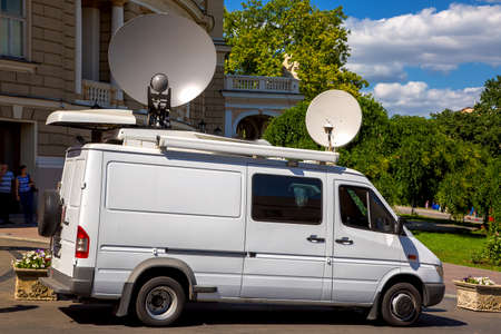Outside broadcasting car, mobile TV station of the emergency news of live broadcast from the place of events.の写真素材