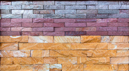 Decorative stone, texture of a three types of color of a stone gray, yellow and claret.の写真素材