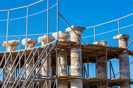 Reconstruction of ancient historical colonnades, colons from a stone shell rock restore the former historical look.の写真素材