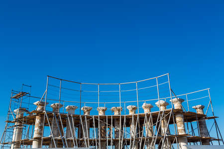 Reconstruction of ancient historical colonnades, colons from a stone shell rock restore the former historical look.の写真素材