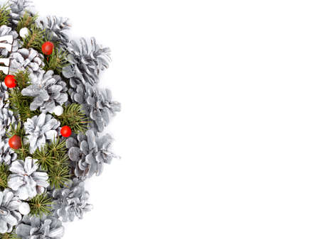 Christmas postcard tamplate from the decor of painted cones in gray colore and free copy space.の写真素材