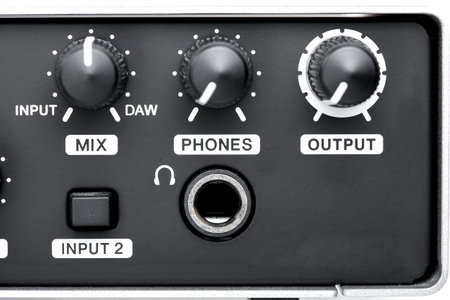 control panel with volume and channel mixing controls and jack headphone input, external sound card...