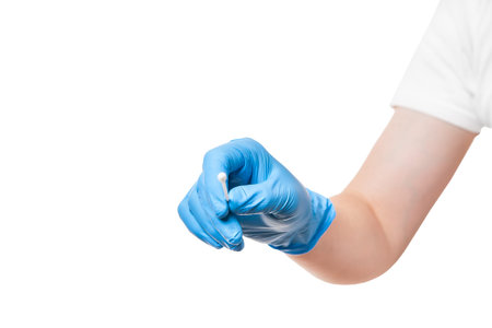 doctor arm in a blue sterile glove hold to give cotton swab for sampling smear analysis from the...