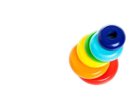 wooden round block of color lgbt flag isolated on white background top view copy space.