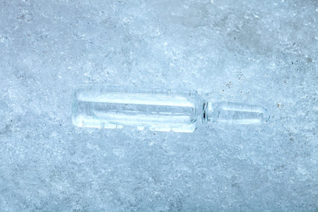 vaccine in a glass transparent ampoule with a medical preparation for the treatment of coronavirus...