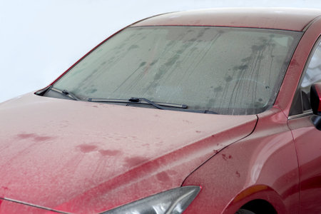 dirty car windshield wipers covered with a layer of dust, abandoned vehicles in the parking, nobody.の写真素材