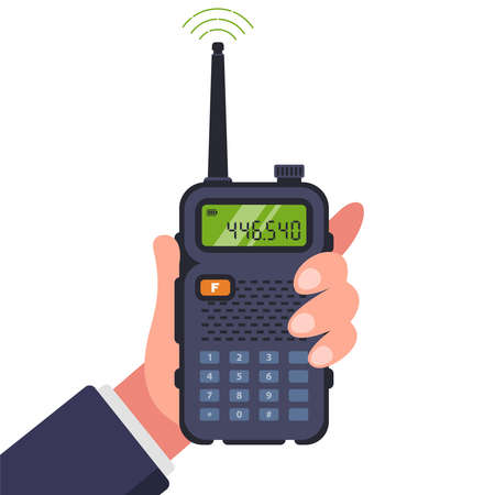 man holds a walkie-talkie in his hand for communication. flat vector illustration isolated on white background.のイラスト素材