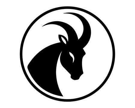black minimalistic capricorn icon with horns. flat vector illustration.のイラスト素材