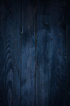 Dark Wooden Background made with aged wood panel.の写真素材