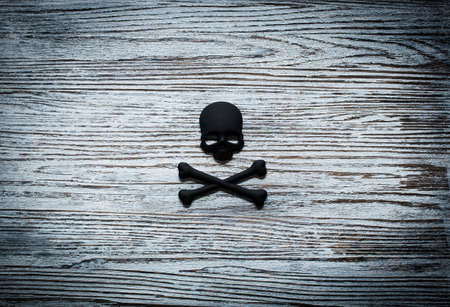 Halloween pumpkins, spiders and various objects on wooden backgroundの写真素材