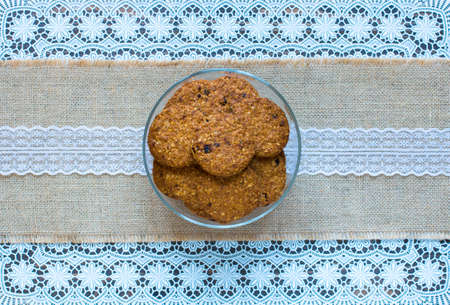 Healthy morning breakfast with cereal biscuits, over a wooden table background.の写真素材