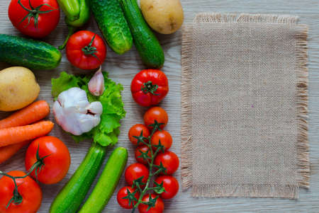 Healthy food and copy space, fresh vegetables, organic on a wooden backgroundの写真素材