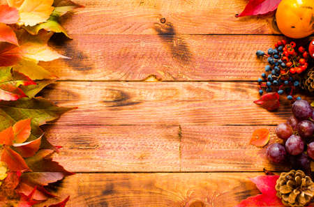 Thanksgiving day, autumn leaves background and text, on different rustic woodenの写真素材