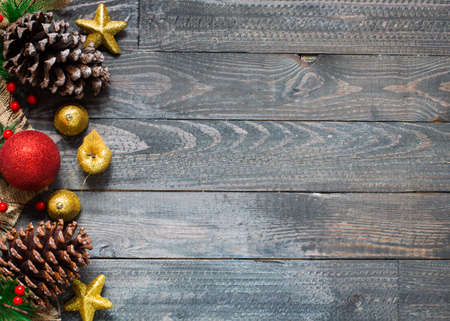 Christmas collection, gifts and decorative ornaments, over wooden backgroundの写真素材