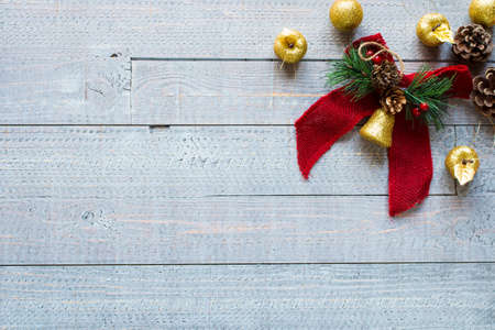 Christmas collection, gifts and decorative ornaments, over wooden backgroundの写真素材