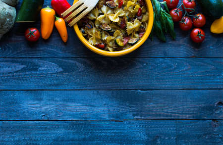 Italian pasta with vegetables: zucchini, tomatoes, peppers and potatoの写真素材