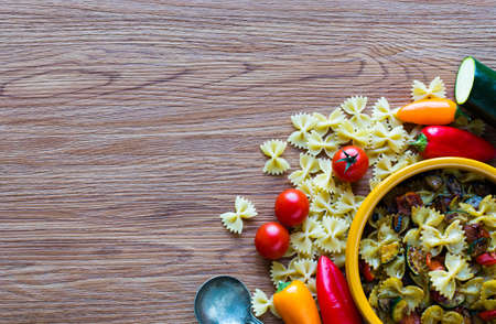 Italian pasta with vegetables: zucchini, tomatoes, peppers and potatoの写真素材