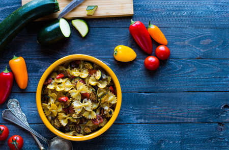 Italian pasta with vegetables: zucchini, tomatoes, peppers and potatoの写真素材