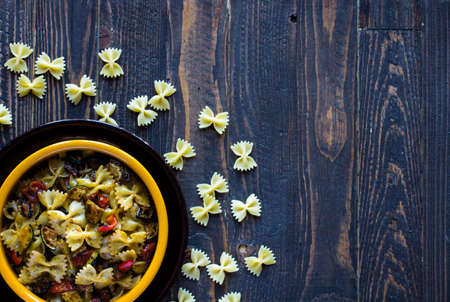 Italian pasta with vegetables: zucchini, tomatoes, peppers and potatoの写真素材