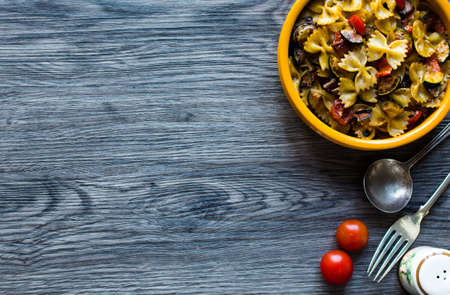Italian pasta with vegetables: zucchini, tomatoes, peppers and potatoの写真素材