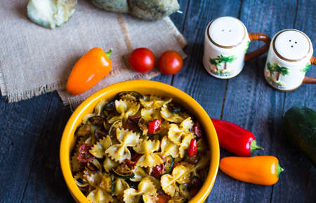 Italian pasta with vegetables: zucchini, tomatoes, peppers and potatoの写真素材