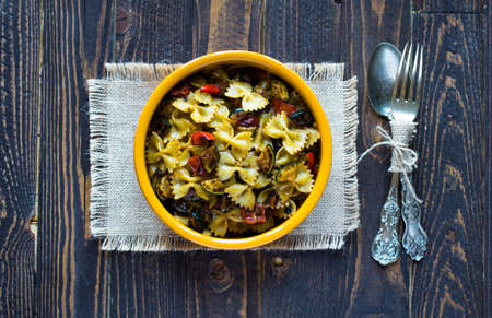 Italian pasta with vegetables: zucchini, tomatoes, peppers and potatoの写真素材