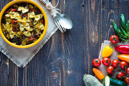 Italian pasta with vegetables: zucchini, tomatoes, peppers and potatoの写真素材