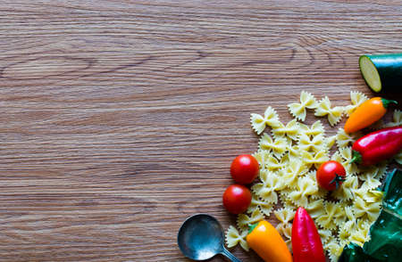 Italian pasta with vegetables: zucchini, tomatoes, peppers and potatoの写真素材