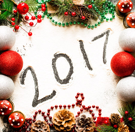 Christmas collection, gifts and decorative ornaments, over wooden background