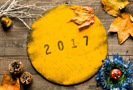 Christmas collection, gifts and decorative ornaments, over wooden background