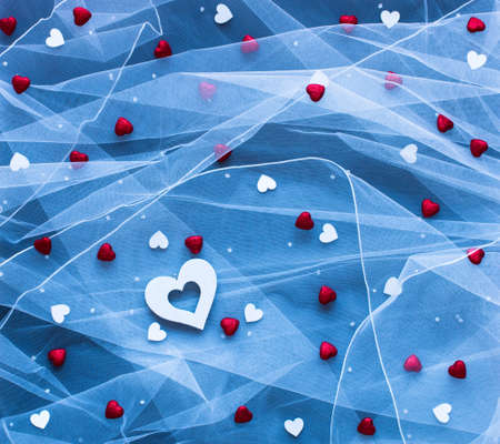Valentine's Day background, with hearts and various romentic elements over an elegant vintage backgroundの写真素材