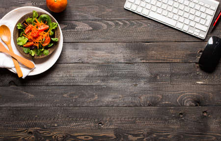 Top view of Healthy Sandwich toast with lettuce, ham, cheese, tomato and coffee, on a wooden backgroundの写真素材