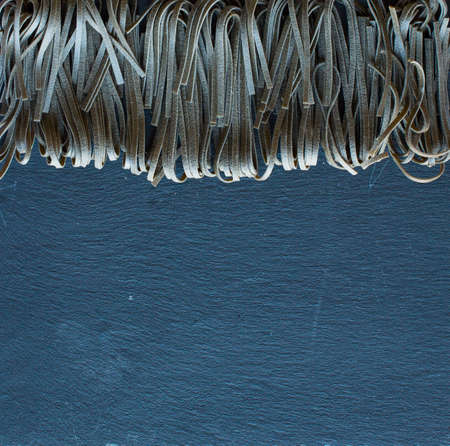 Pasta background. Several types of pasta homemade,  Free space for text. Top viewの写真素材