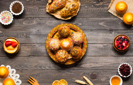 Delicious homemade muffins with yogurt, on a wooden background with space for text. Top viewの写真素材