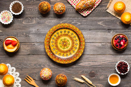 Delicious homemade muffins with yogurt, on a wooden background with space for text. Top viewの写真素材